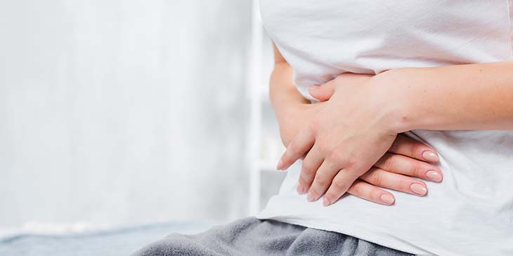 significado espiritual dor de barriga