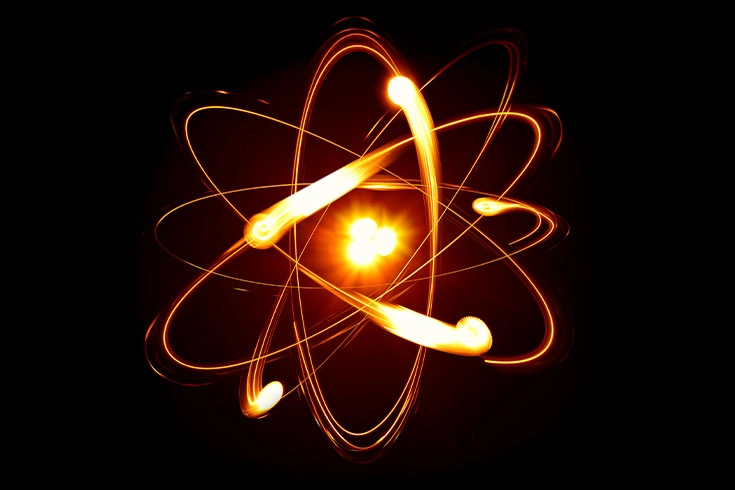 Imagem de átomo, com eletrons circulando seu núcleo